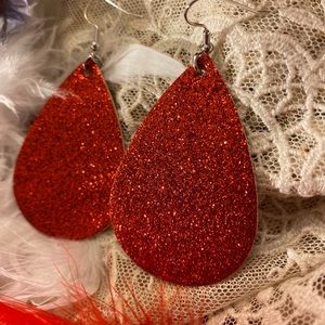 Red sparkly valentines earrings.